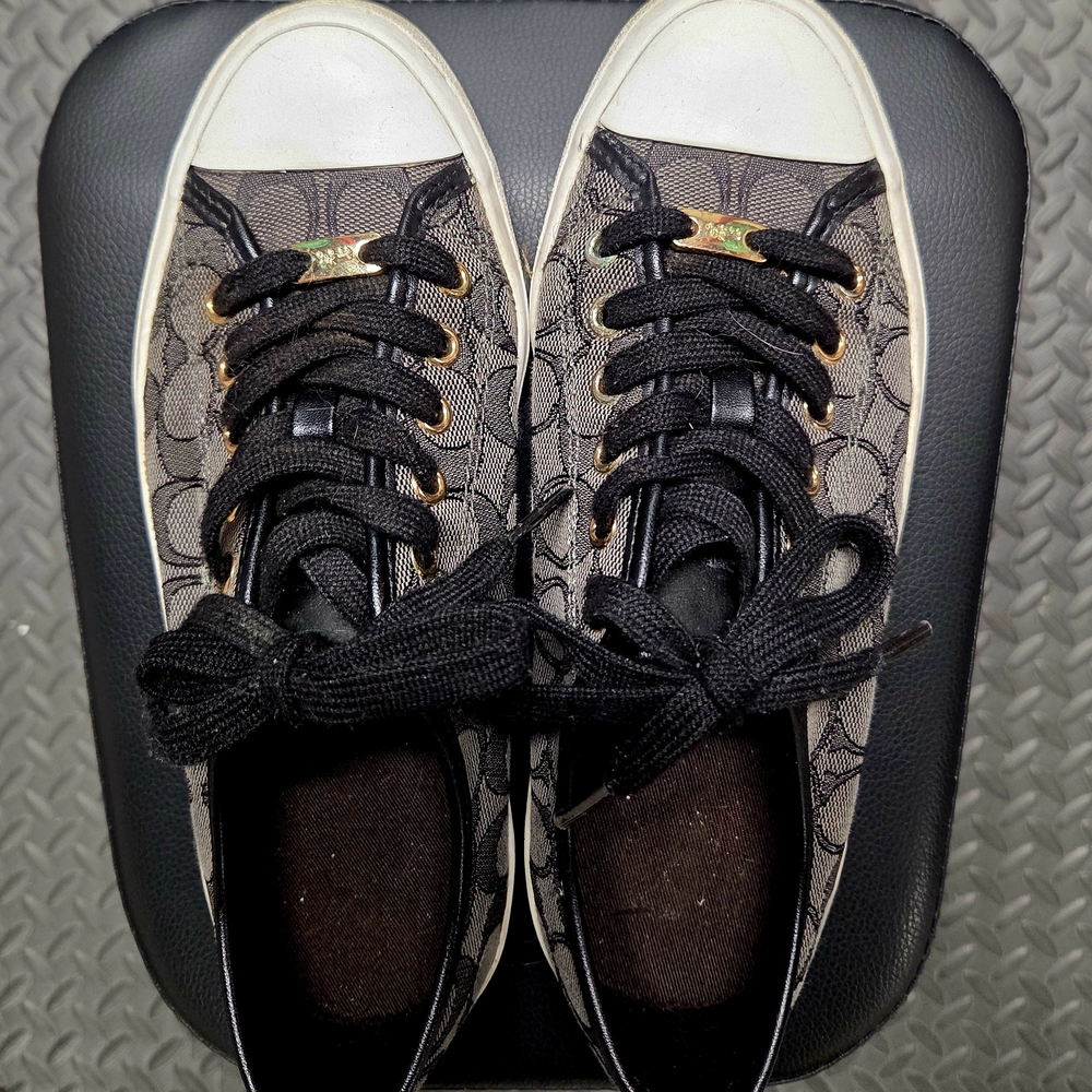 Coach Black and White Sneakers with Gold Accents